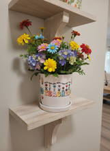 Load image into Gallery viewer, Colorful flowers in a pot labeled 'Teacher' on a wooden shelf.