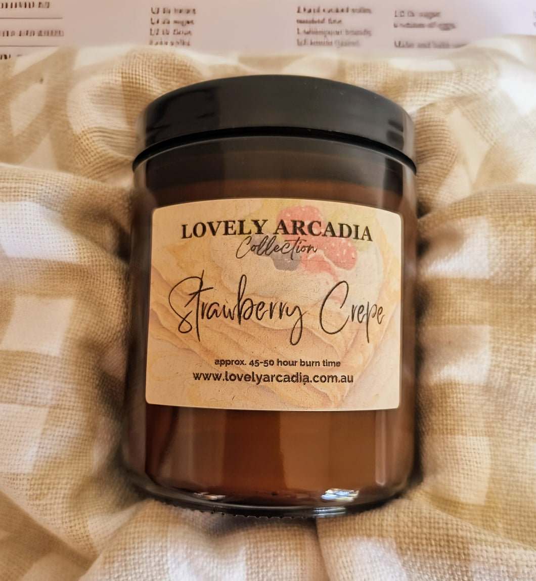 Candle with 'Lovely Arcadia' label on a textured beige fabric background