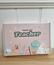 Load image into Gallery viewer, Box with &#39;Thank You Teacher&#39; text and educational illustrations on a wooden surface.
