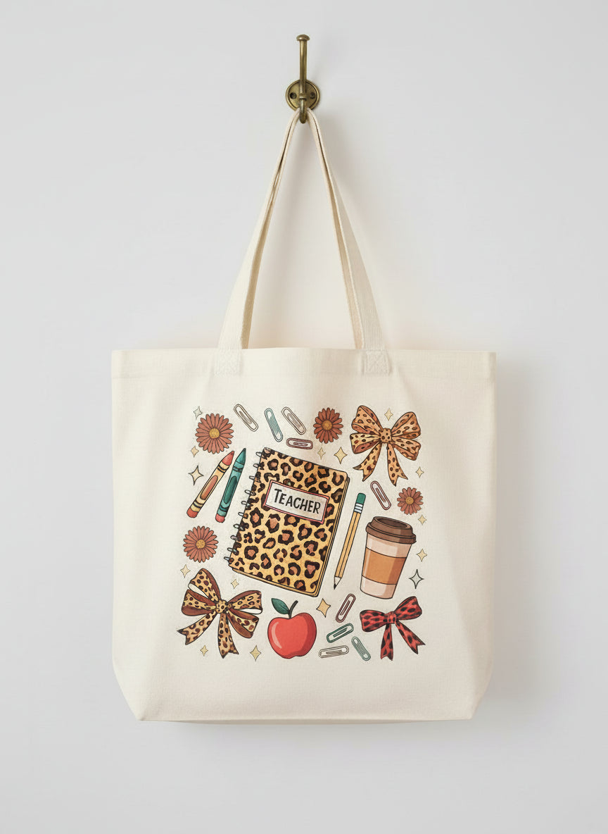 Tote bag with teacher-themed design on a checkered fabric background