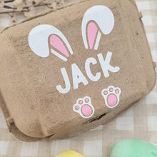 Load image into Gallery viewer, Egg carton with a bunny and a name.
